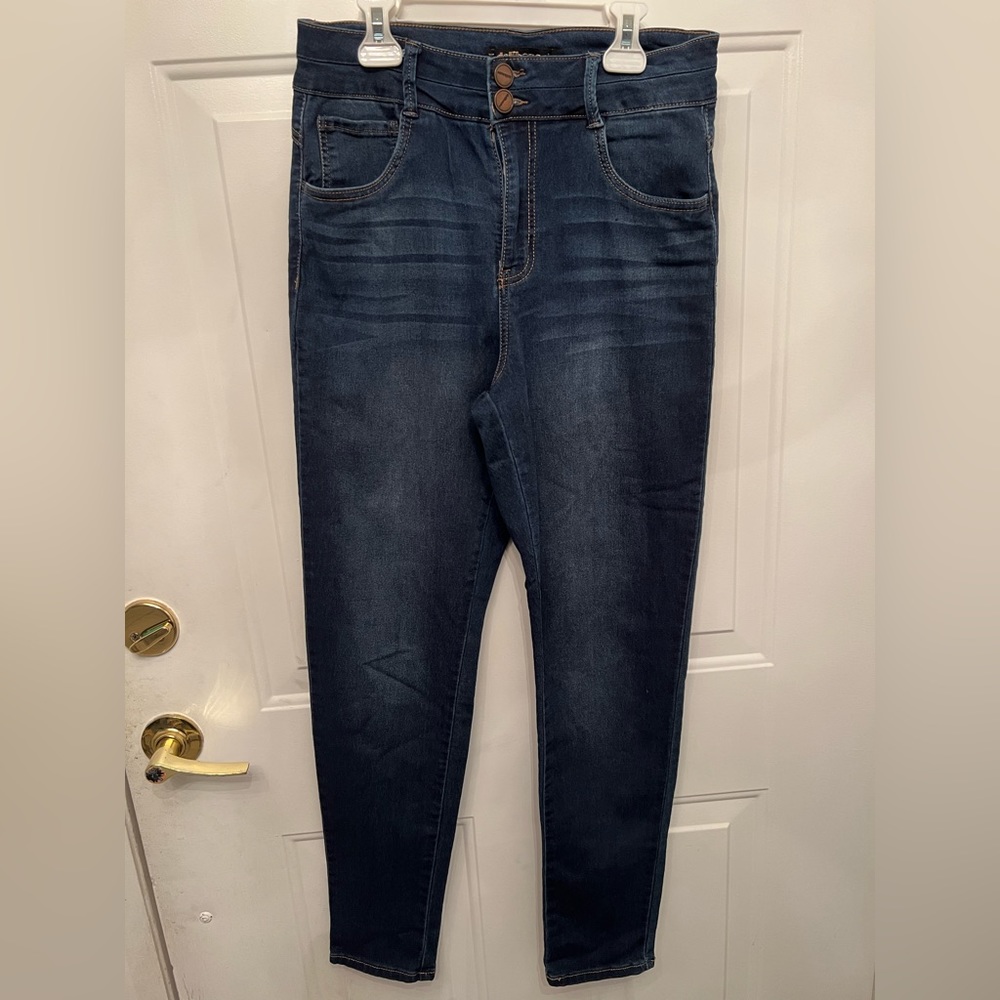 Stretch blue jeans, double button, back pockets and front. Size 11/12 waist 30